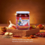 Barni Flavours Rajasthani Chutney jar with fresh red chillies, garlic, and Indian spices – authentic homemade pickle